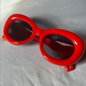 Bold Red Oval Sunglasses